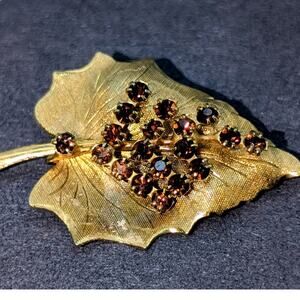 Vintage Gold Tone Leaf Brooch W/ Garnet Color Rhinestones